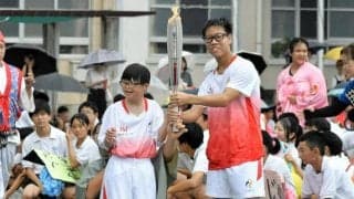 スポーツで「壁を打ち破る」を掲げ、学校聖火リレー　名古屋・汐路中